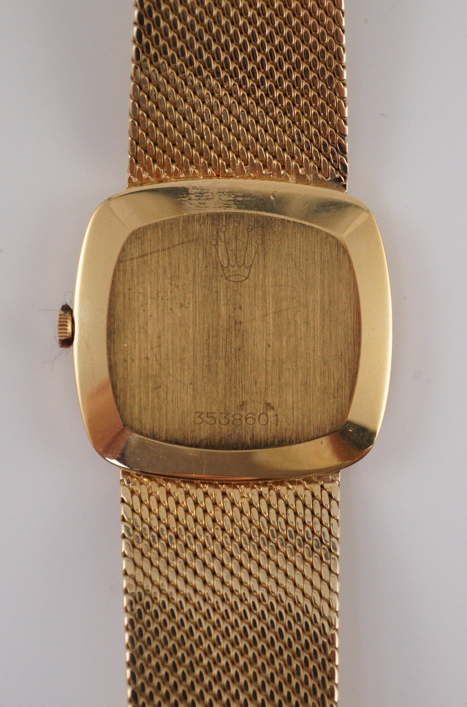 A gentleman's 1970's 18ct gold Rolex Cellini manual wind wrist watch, on an integral brushed gold bracelet